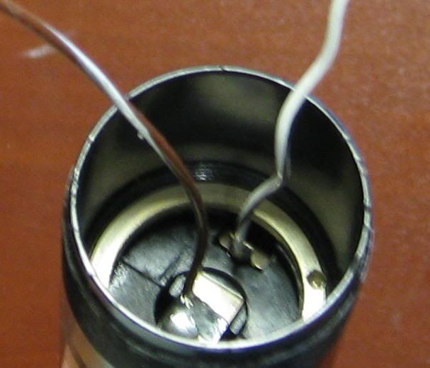 How to reassemble pre2001 C Maglite switch Candle Power Flashlight